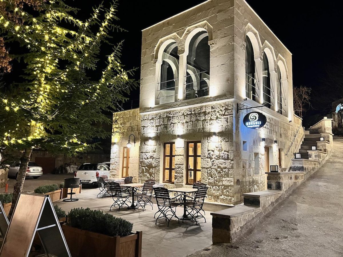 The terrace and stone façade of Gorgoli Lounge & Eatery